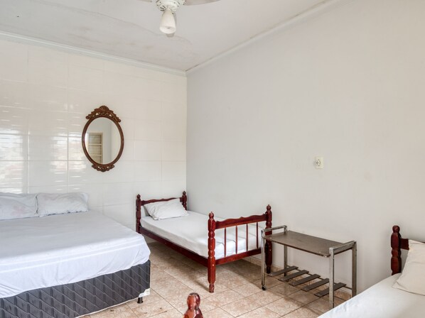 Triple Room, Multiple Beds | Minibar, iron/ironing board, free WiFi, bed sheets