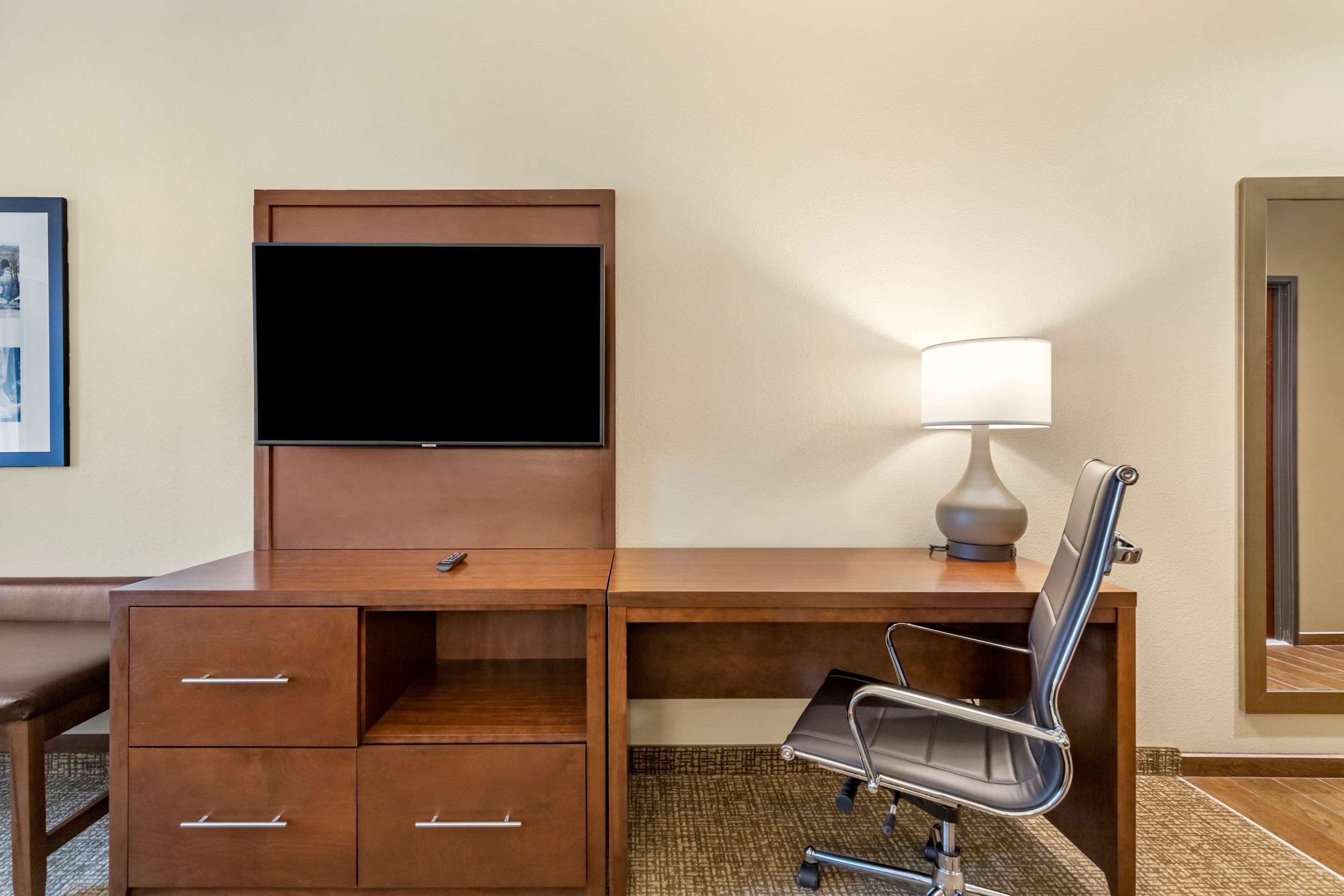 suite, 1 king bed, non smoking | desk, laptop workspace, blackout curtains, iron/ironing board