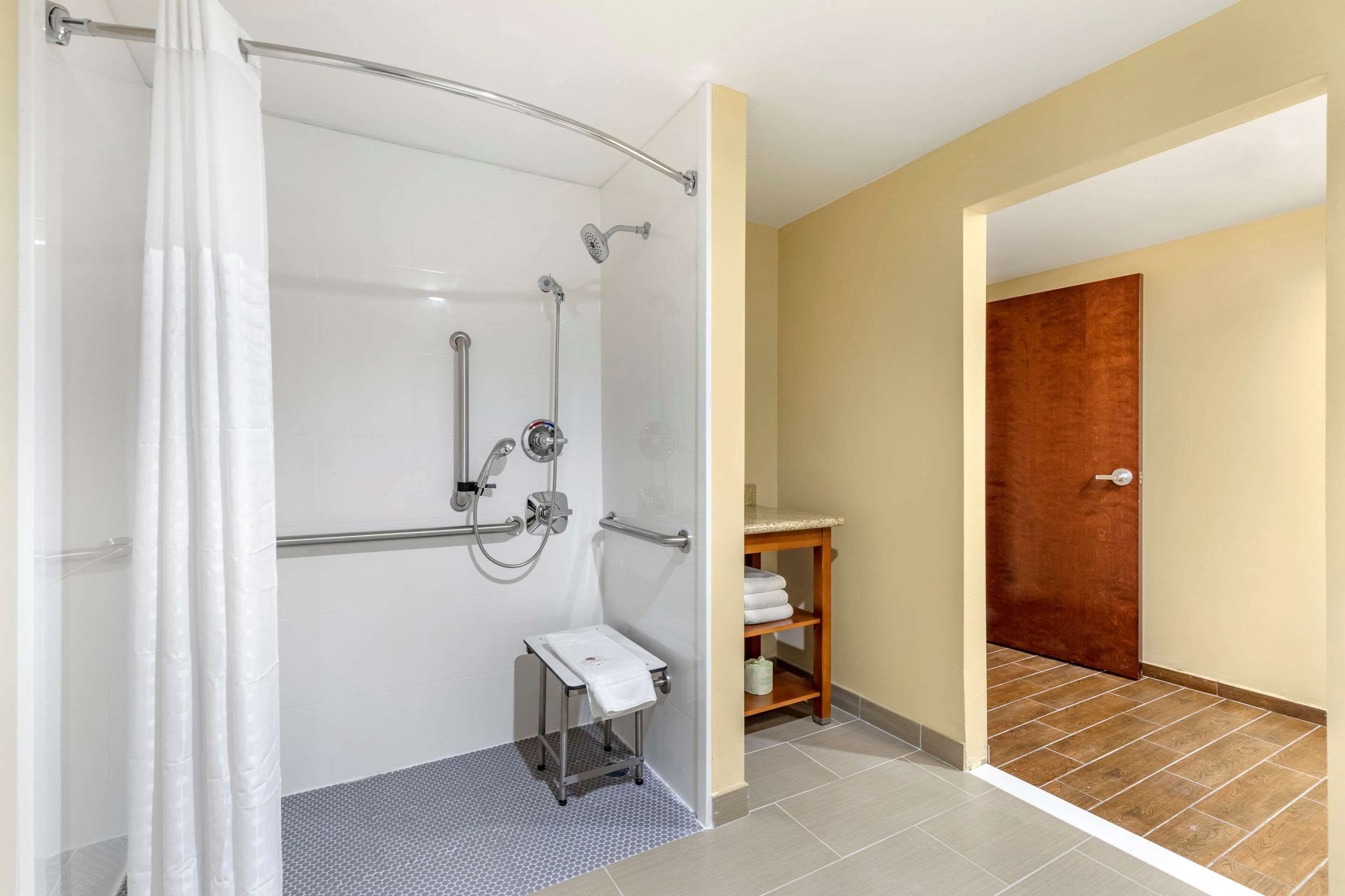 suite, 2 queen beds, accessible, non smoking | bathroom | free toiletries, hair dryer, towels