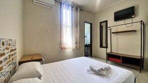 Cortinas blackout, wifi gratis y ropa de cama 