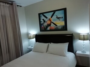 1 habitación, tabla de planchar con plancha, wifi y ropa de cama 