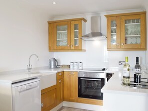 Oven, dishwasher, high chair, cookware/dishes/utensils