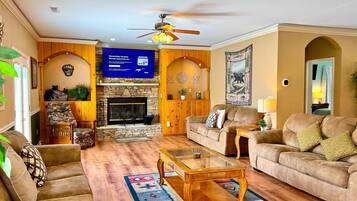 Smart TV, chimenea, reproductor de DVD y futbolito