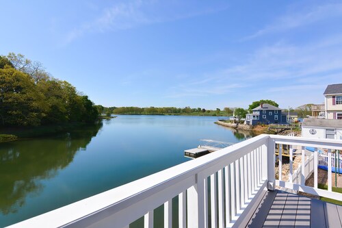 Afternoon Delight: Toast the beauty of the river from the waterfront deck