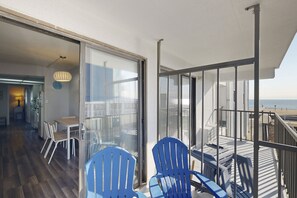 Outdoor dining - Second-floor, ocean-view condo with beach views, pool access, washer/dryer & AC (Ocean City)
