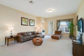 Condo, 3 Bedrooms, 2 Bathrooms | Living area | 55-inch flat-screen TV with cable channels, TV, DVD player - Chantilly Villa by VillaDirect (Orlando)