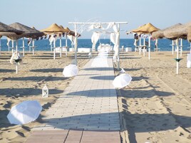 Private beach, sun loungers, beach umbrellas, beach volleyball