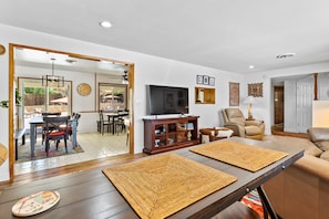 Smart TV, fireplace, books, stereo