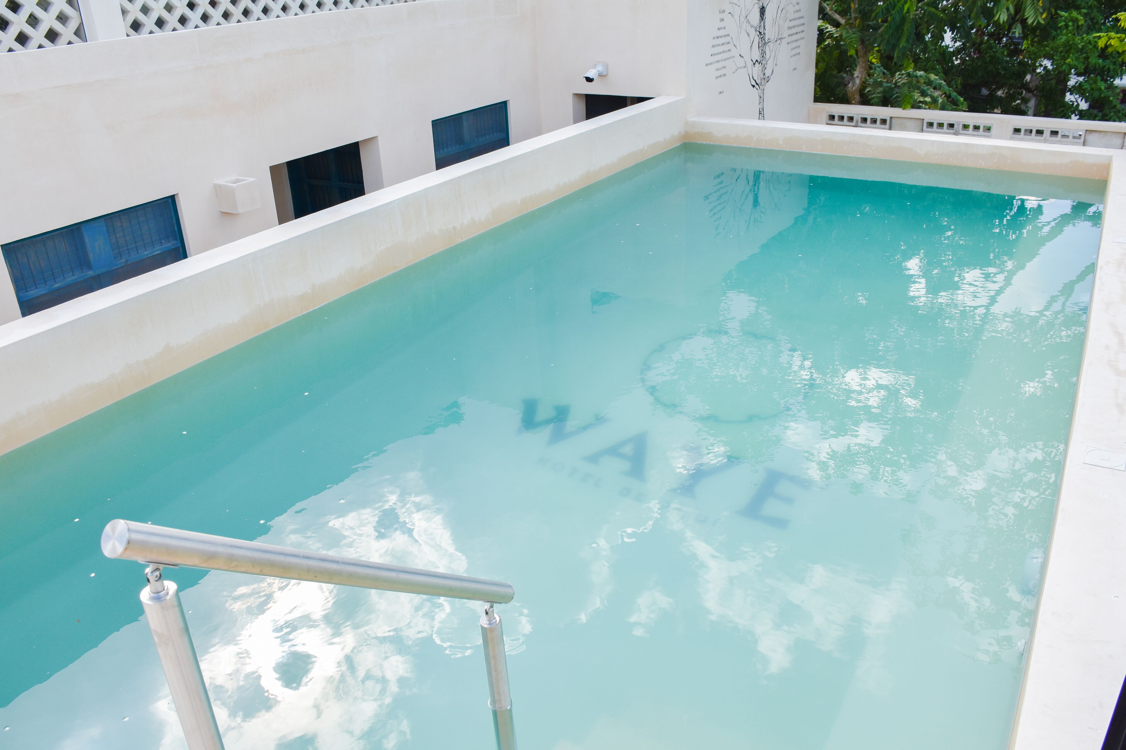 outdoor pool, open 8:00 am to 9:00 pm, pool loungers