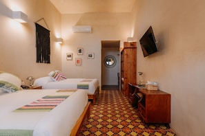 Deluxe Family Room with Balcony, Air Conditioning and Private Bathroom | Premium bedding, down comforters, individually decorated - Waye Valladolid Centro – Sustainable, Authentic Experiences & Pet Friendly Boutique Hotel (Valladolid)