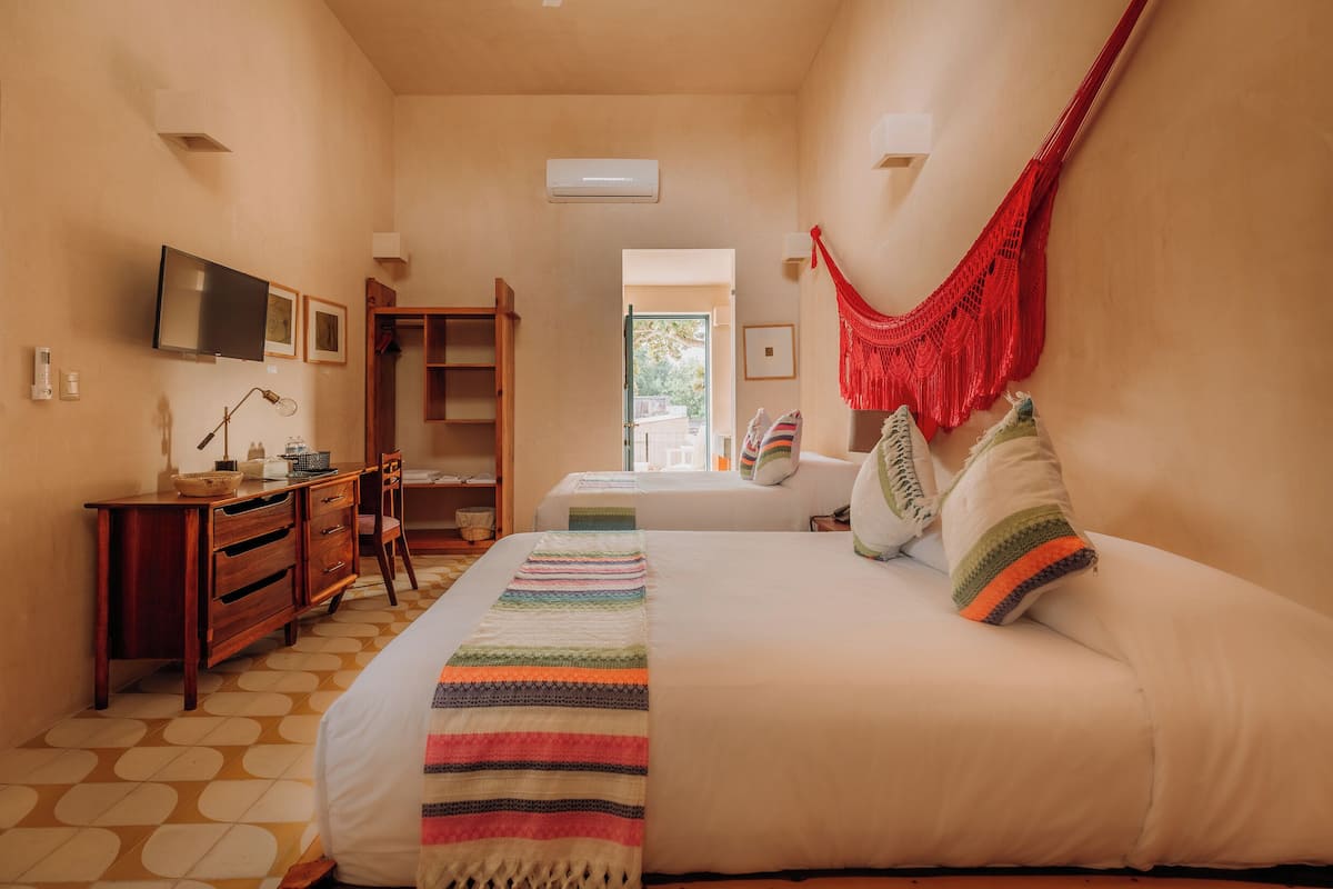 Premium bedding, down comforters, desk, laptop workspace