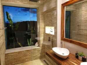Grand Villa, Non Smoking, Garden View | Bathroom | Shower, rainfall showerhead, free toiletries, hair dryer - Mango Tree Siargao (General Luna)