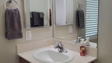 Hair dryer, towels, soap, shampoo