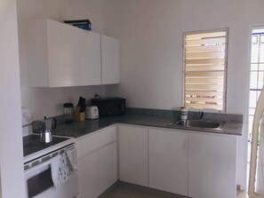 Mesas de jantar, cozinha com ilha