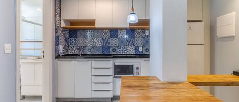 Fridge, microwave, coffee/tea maker, toaster