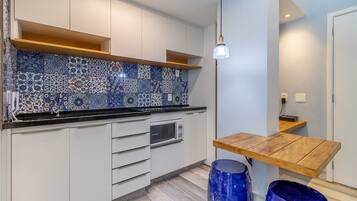 Fridge, microwave, coffee/tea maker, toaster