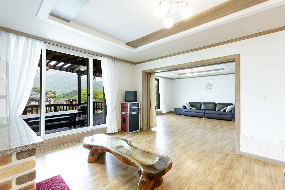 Condo (Ruby, Max 7 People) | Living room | Flat-screen TV, DVD player