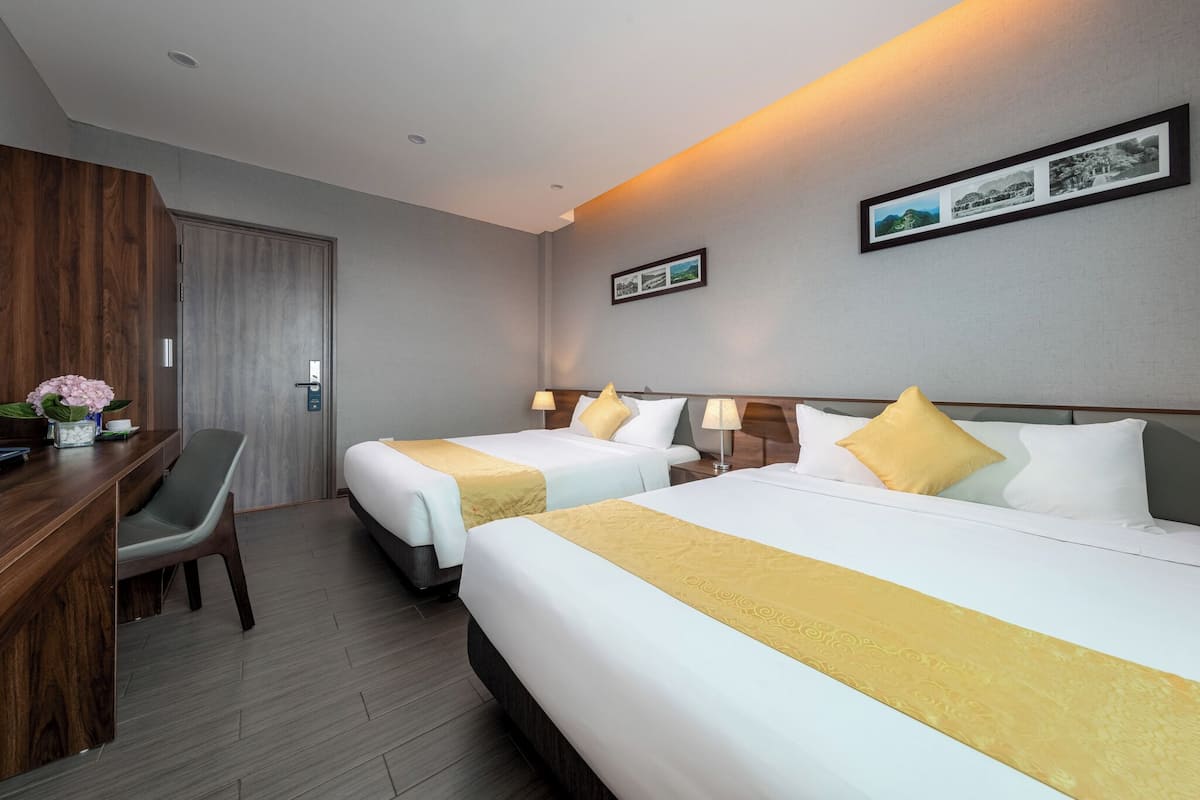 Standard Quadruple Room | Minibar, in-room safe, desk, free WiFi