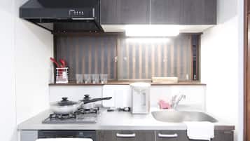 Apartment | Private kitchenette | Fridge, microwave, electric kettle, cookware/dishes/utensils