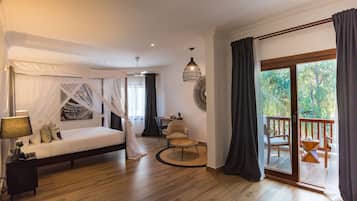 Habitación Deluxe | Caja fuerte, cortinas opacas, wifi gratis y ropa de cama
