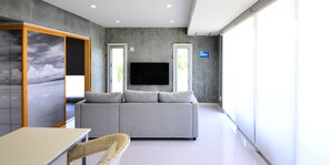 Theme Suite 101 "Kin" | Living area | Flat-screen TV - SOU Higashi-Onna (Uruma)