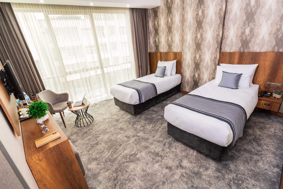 Deluxe Twin Room | 1 bilik tidur, cadar kapas Mesir, peralatan tempat tidur premium