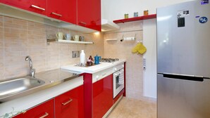 Apartment, 1 Bedroom | Private kitchen | Espresso maker, full-size fridge, microwave, oven - St Peter Mediatrice Apartment (Rome)