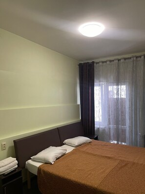 Economy-Doppel- oder -Zweibettzimmer | Hochwertige Bettwaren, Daunenbettdecken, Select-Comfort-Betten