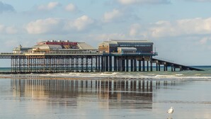 A seaside pier with a theater and a restaurant. - Wheelwrights, Sustead, Norfolk (Sustead)
