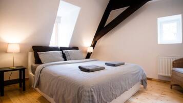1 bedroom, desk, iron/ironing board, travel crib