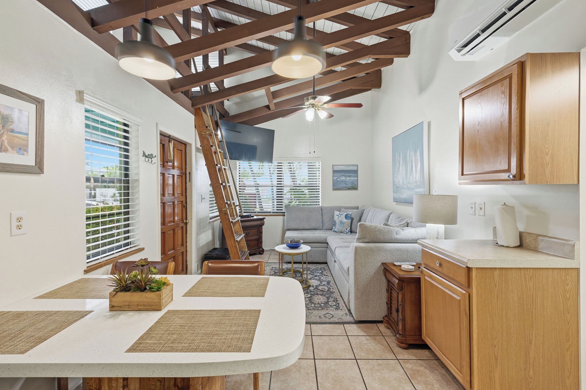 Suite, 2 Bedrooms | Living area | 32-inch flat-screen TV with cable channels, TV