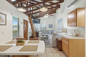 Suite, 2 Bedrooms | Living area | 32-inch flat-screen TV with cable channels, TV