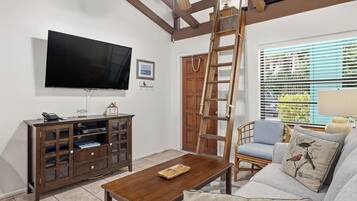 Suite, 1 Bedroom | Living area | 32-inch flat-screen TV with cable channels, TV