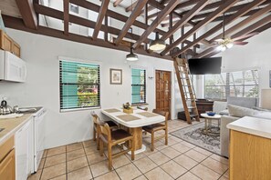 Suite, 2 Bedrooms | Living area | 32-inch flat-screen TV with cable channels, TV