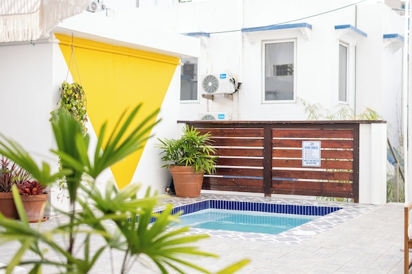 Outdoor pool, pool umbrellas, sun loungers