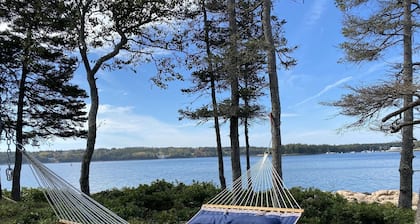 Quaint and rustic cottage nestled on the shores of a small Maine village.