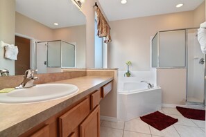 House (7 Bedrooms, 4.5 Bathrooms) | Bathroom | Separate tub and shower, hair dryer, towels, soap