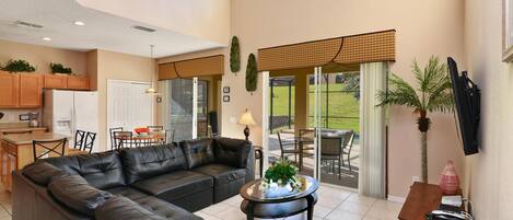 House (7 Bedrooms, 4.5 Bathrooms) | Living room | 55-inch LCD TV with cable channels, TV, DVD player