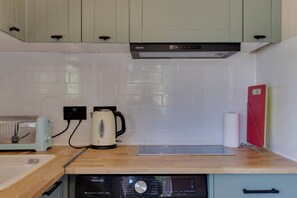 Fridge, microwave, toaster, cookware/dishes/utensils