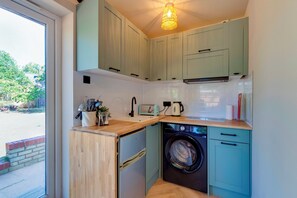 Fridge, microwave, toaster, cookware/dishes/utensils