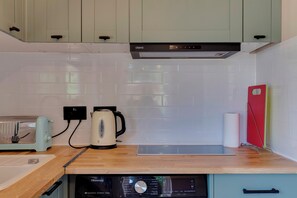 Fridge, microwave, toaster, cookware/dishes/utensils