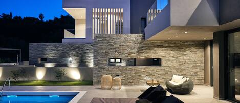 Outdoor pool, a heated pool, pool loungers