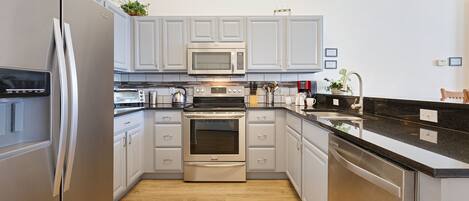 House, 4 Bedrooms (3 Bathrooms) | Private kitchen | Full-sized fridge, microwave, oven, stovetop