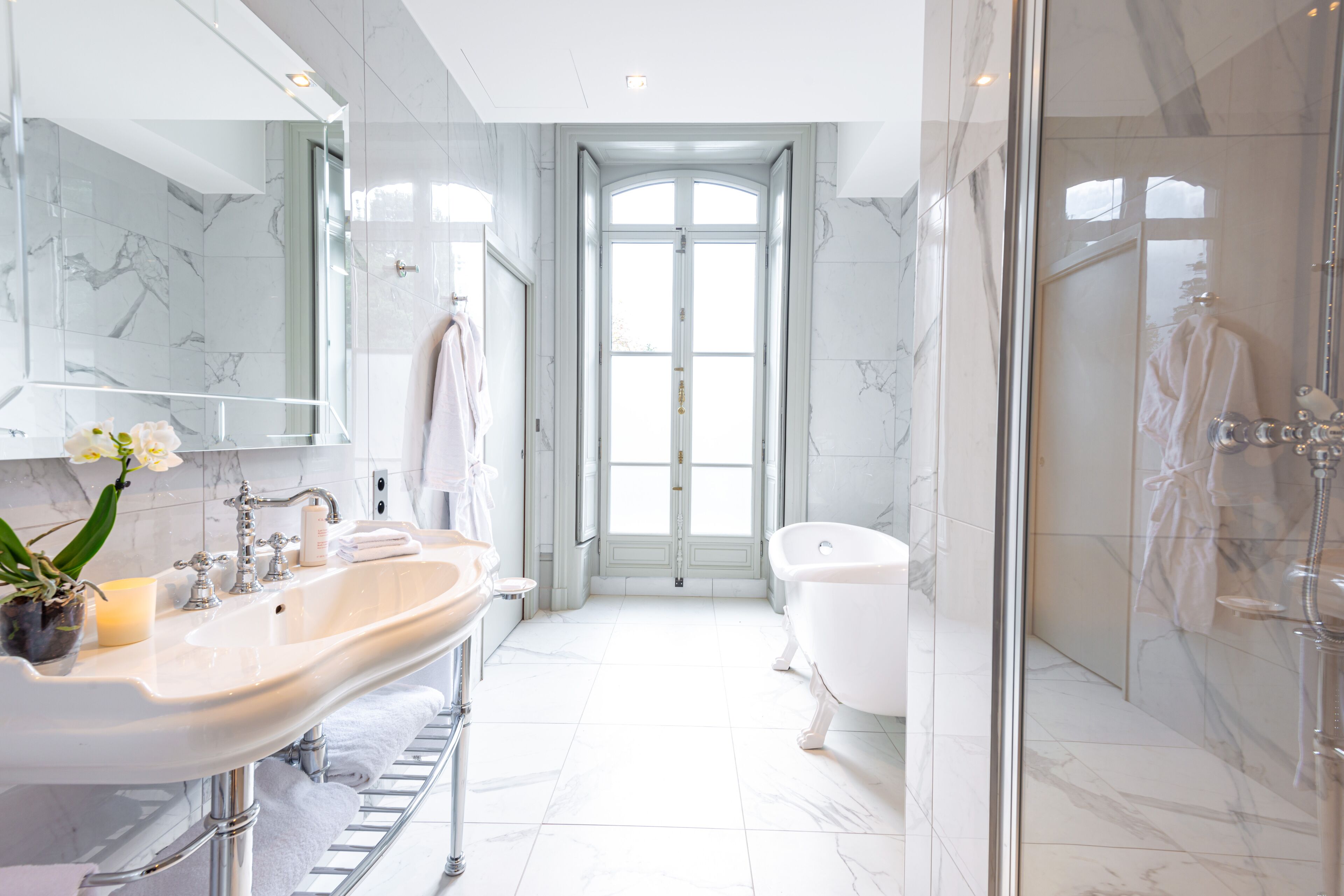 superior room | bathroom | rainfall showerhead, free toiletries, hair dryer, bathrobes