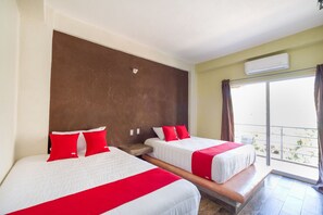 Standard Room, 2 Queen Beds | Soundproofing, bed sheets - OYO Hotel Posada Lys, Zihuatanejo (Zihuatanejo)