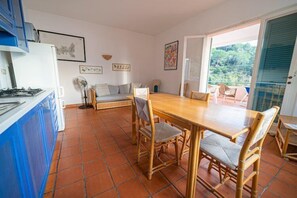 Apartment, 1 Bedroom (Bilocale 1 Baia Blu) | In-room dining