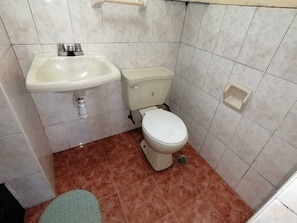 Shower, rainfall showerhead, towels, soap
