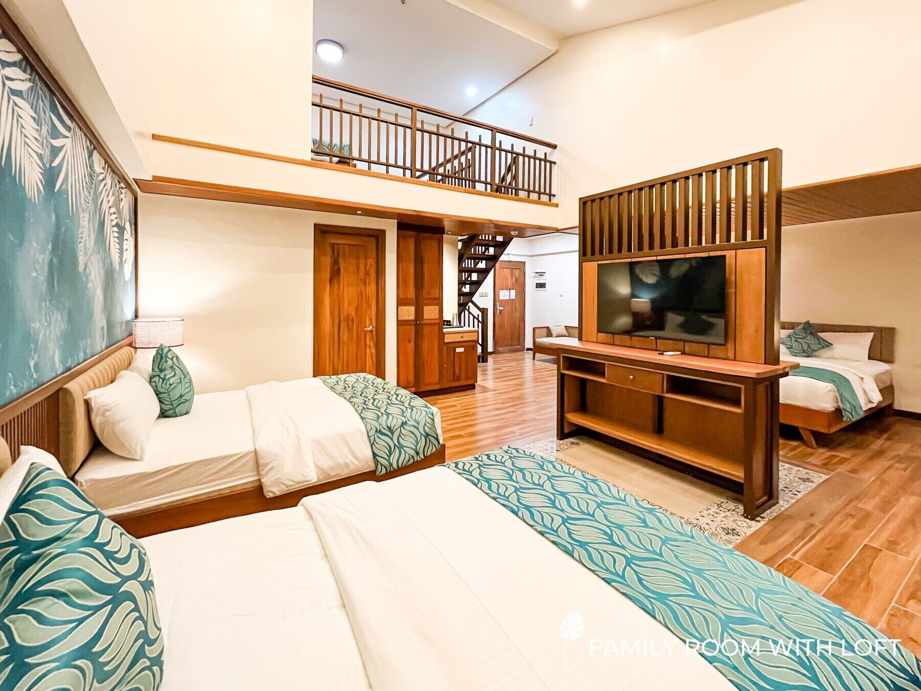 Habitación familiar | Ropa de cama de alta calidad y edredones de plumas
