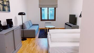 46-inch flat-screen TV with cable channels, TV