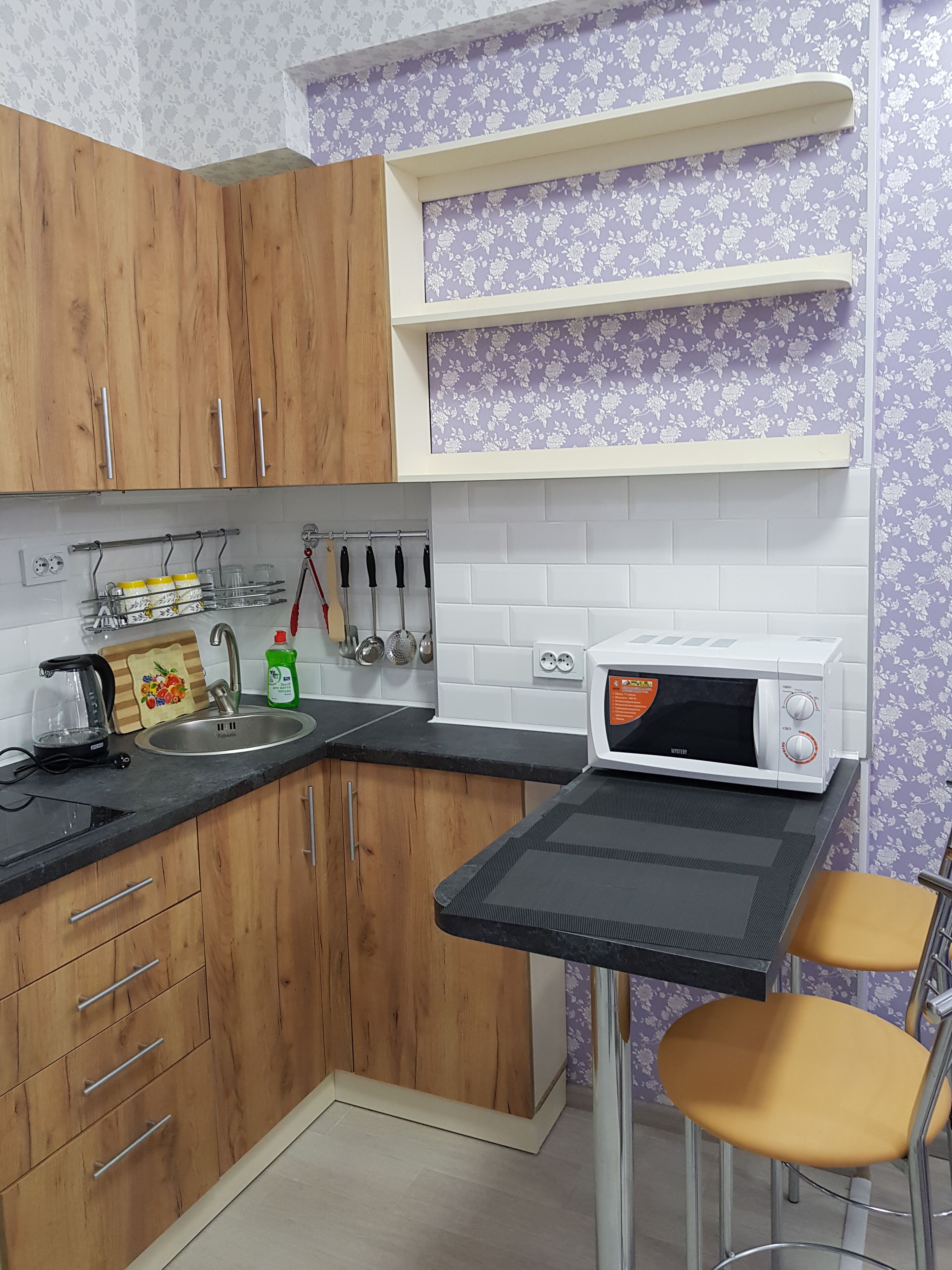 Full-sized fridge, microwave, stovetop, electric kettle